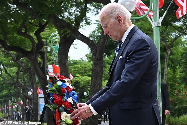 President Joe Biden paid tribute to John McCain on Monday by visiting the monument in Hanoi that marks where the late senator's plane was shot down before he spent five and a half years as a prisoner of war in Vietnam