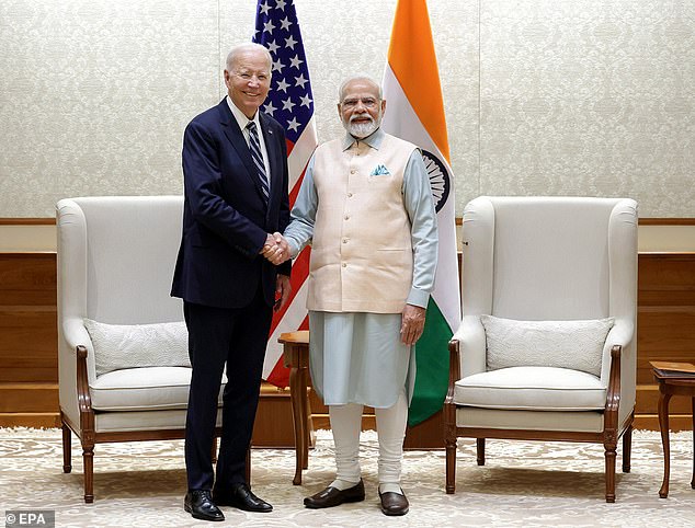 President Biden met with Indian Prime Minister Narendra Modi at the start of his trip to India.  The Indian government released a handout photo after the American press.  The White House said India was disappointed that the Russian and Chinese leaders did not attend and pleased that Biden did