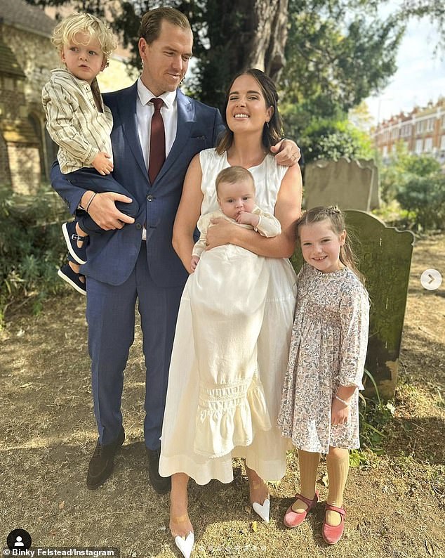 Adorable: Binky Felstead, 33, shared sweet snaps of her son Wilder, four months, and Wolfie, two, baptized on Sunday with husband Max Darnton and daughter India, five