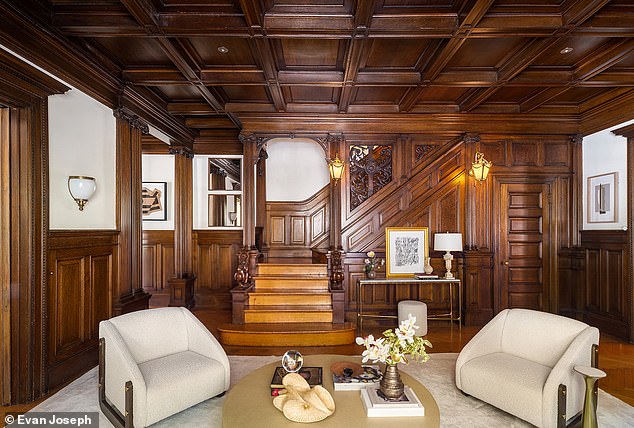 Located in Brooklyn, New York City, the lavish home is complete with top-notch designs, including intricate moldings and traditional carved wood finishes