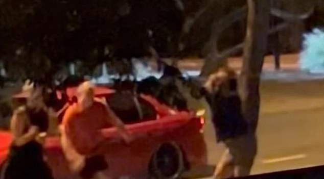 The video shows two men and two women exchanging blows on First Avenue in Woorim, Bribie Island, about 10.40pm on Thursday evening.