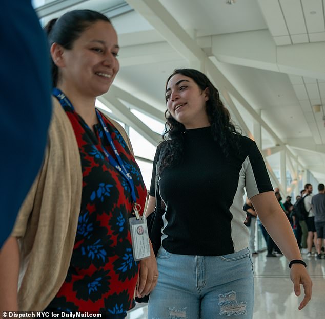 Ivana Paolozzi (left) smiles as she leaves Bronx Court on Tuesday.  She is charged with tampering with physical evidence, concealing a human corpse and hindering the death of her daughter.