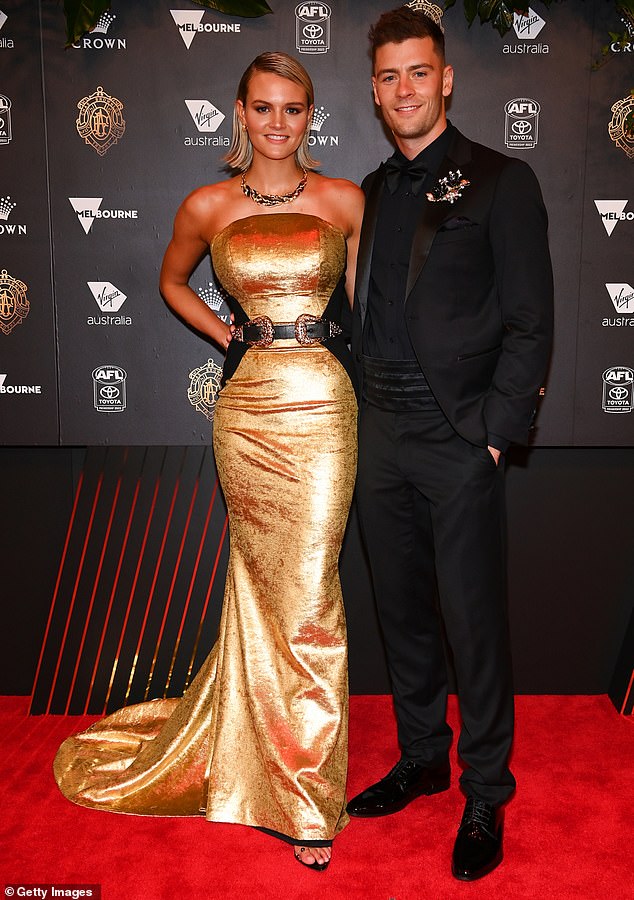 There were several misses from some of Australia's favorite WAGS in 2022, with Josh Dunkley's girlfriend Tippah Dwan (left) failing to hit the right notes in her metallic gold dress, cowboy-style belt at the waist and matching necklace