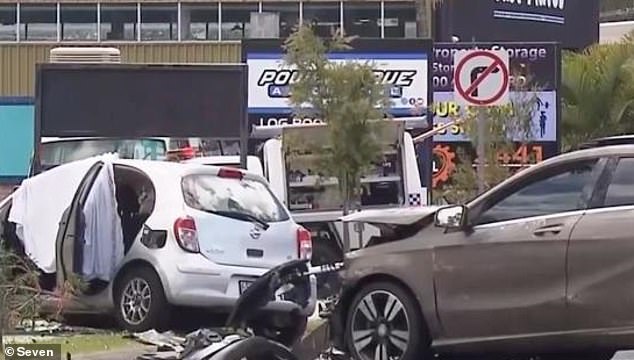 Stella Tan died when her Nissa Micra was struck at 7.23am on Windsor Road in Burnside, near the Sunshine Coast in south-east Queensland.  Pictured: The aftermath of Friday's fatal accident