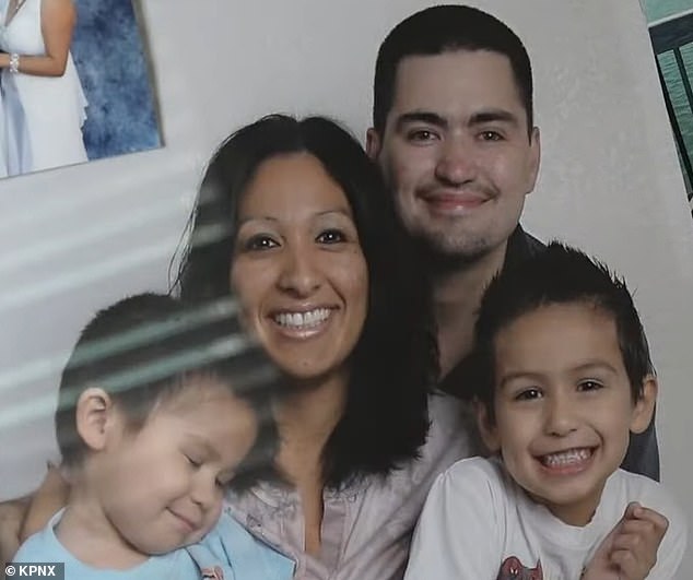 Michael Jacobs, 49, is survived by his wife Stacy Jacobs and two children (pictured together) after he was shot at his CVS store in Mesa, Arizona on September 7 by a customer accused of theft