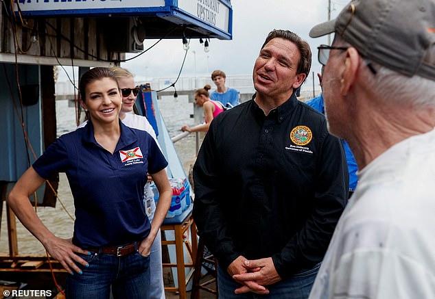 A super PAC supporting Ron DeSantis is launching a parent group similar to the Mamas for DeSantis group that Casey DeSantis launched - above, Ron and Casey DeSantis talk to Floridians affected by Hurricane Idalia