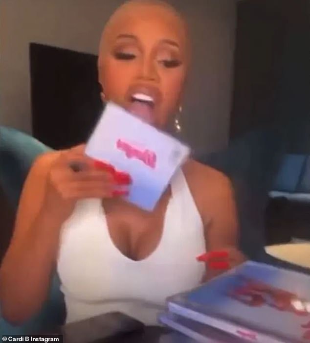 That will sell copies!  Cardi B is giving fans the 'scratch and sniff' experience when it comes to her new collaboration with Megan Thee Stallion