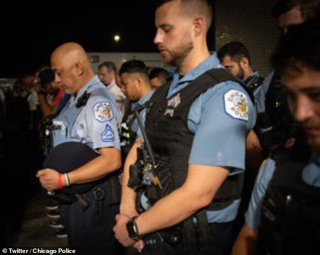 CPD officers paid their respects outside the hospital where the injured officer was being treated