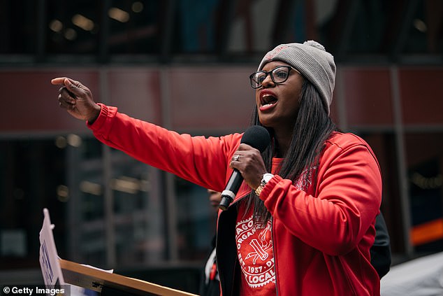 Davis Gates has long been an opponent of private schools.  She is pictured at a downtown rally in support of the Chicago teachers strike on October 23, 2019