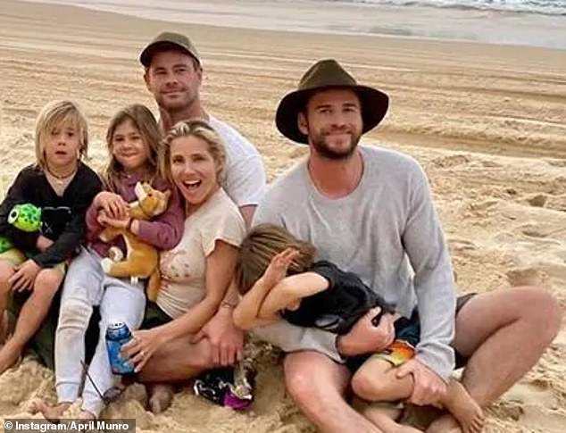 Chris Hemsworth's son was in charge of his Hollywood star uncle Liam (far right) as he demonstrated his skills on a dirt bike