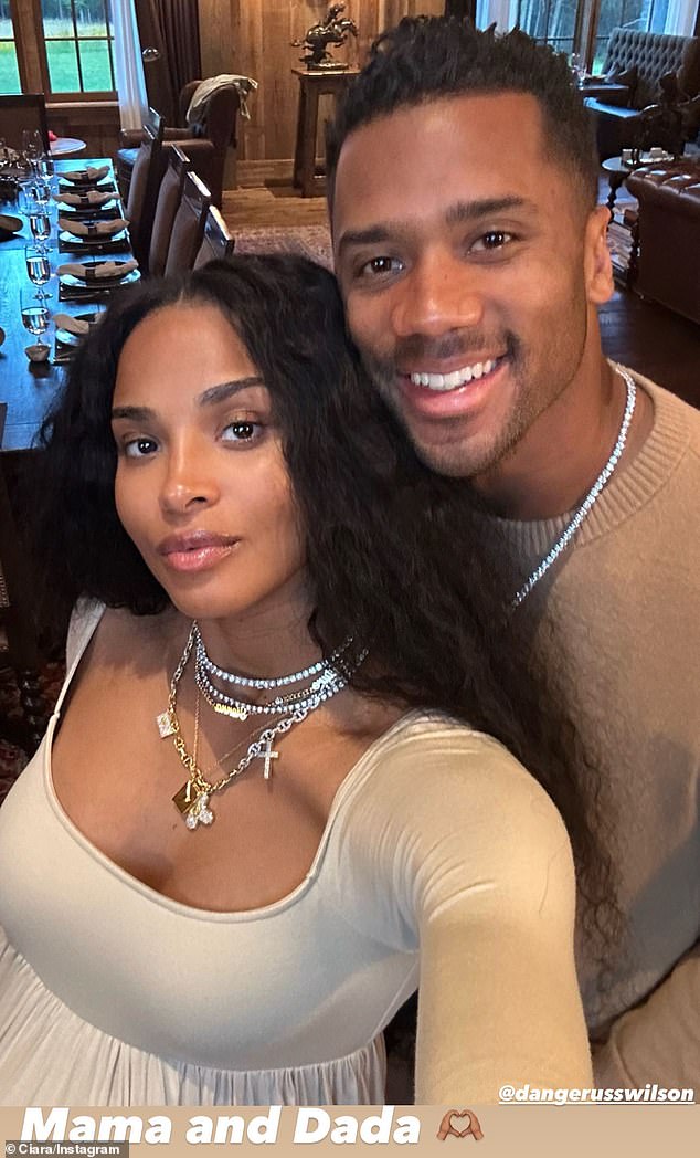 Happy couple: The artist, who recently appeared in a music video for her new song Forever, was later joined by her husband, Russell Wilson, for another selfie, and she added a text image to the photo that read 