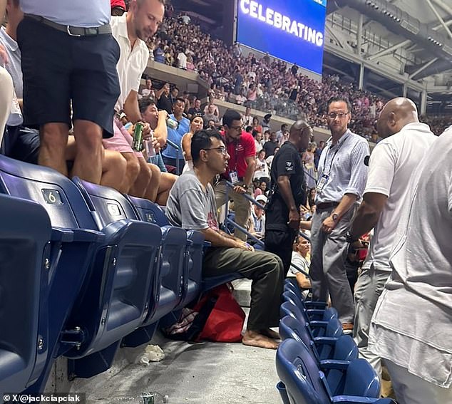 One man from the British group even glued his feet to the floor at Arthur Ashe Stadium