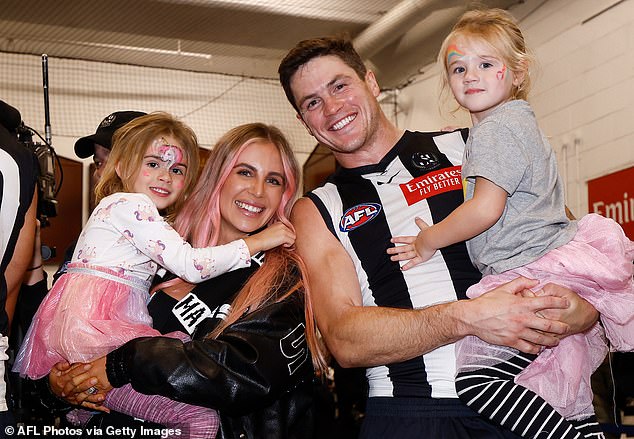 Jack Crisp and wife Mikayla (pictured with daughters Lilah and Sloane) are expecting their third child to arrive around the time of the AFL grand final