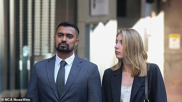 Danushka Gunathilaka was pictured holding hands and smiling with a mystery woman as he stood in court in Sydney on Monday