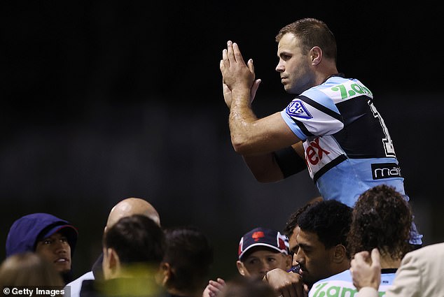 Captain Wade Graham (pictured as he was chaired after playing his final NRL match on Saturday night) defended the decision to shoot on goal