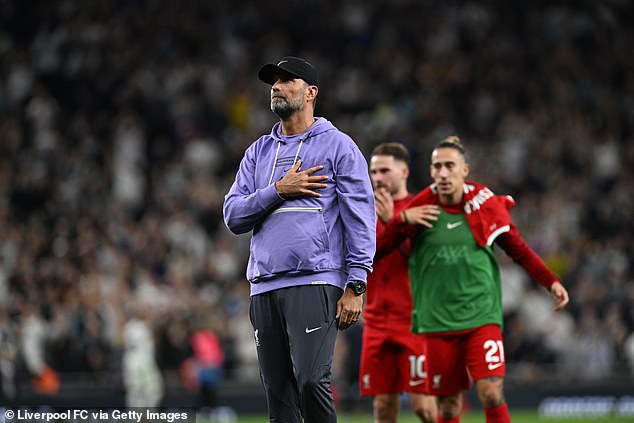 Liverpool showed they are in the title race after a resilient performance against nine-man Tottenham