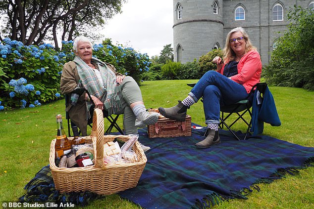 Love: Judi Dench has called Scotland her 'spiritual home' after filming in the Scottish countryside for her Countryfile special (pictured with Charlotte Smith at Inveraray Castle on Countryfile)