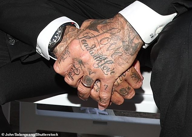 Tribute: He has had 'Posh' inked on the middle finger of his left hand, a nod to Victoria's Spice Girls nickname, and has been spotted with the subtle new tattoo