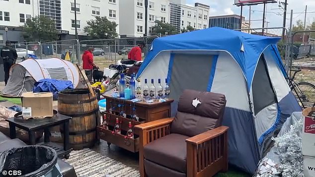 A homeless camp in Denver has a decorated open-air bar that also rents tents for prostitution