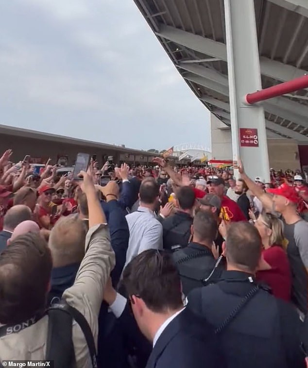 Trump made a grandstand entrance during the showdown in Iowa by wading through the crowd