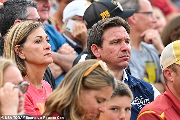 DeSantis sat in the stands with Iowa Governor Kim Reynolds, while Trump opted for a glass box surrounded by Secret Service agents