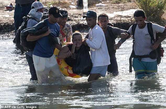 Honduran double amputee Maria Argentina, 32, was pictured this weekend trying to cross the US-Mexico border at Eagle Pass, Texas