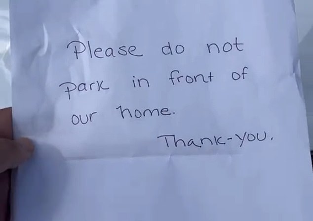 A driver received an angry note from a 'Karen' telling him not to 'park in front of her house' before the two collided in a very heated argument