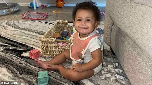 A nine-month-old girl has died in a horror accident after she was thrown from a BMW in which she had been left unsecured when it crashed into a utility pole in Arizona.  A beaming photo of young Nylah sitting among toys was posted to a Go Fund Me page started by the family