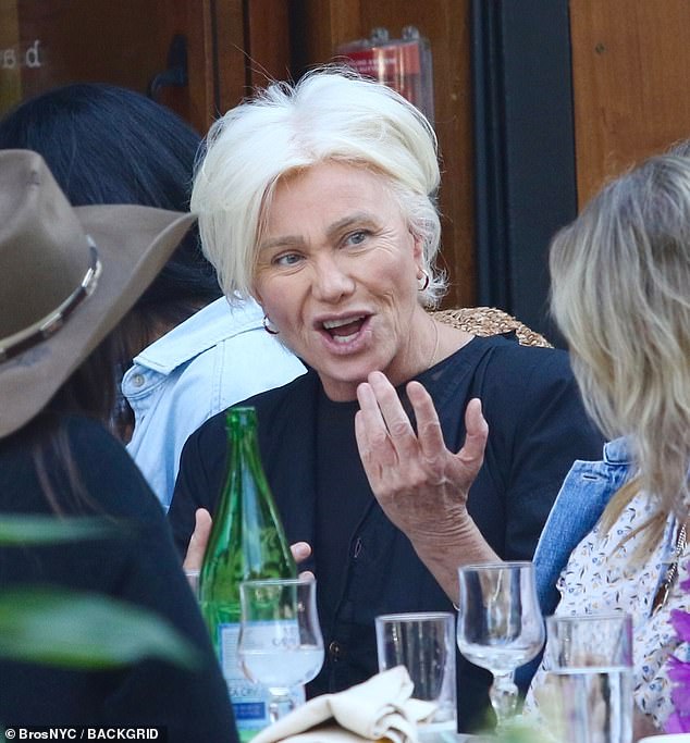 Ring removed: Hugh Jackman's ex-wife Deborra-Lee Furness was seen without her wedding ring while out to lunch with friends in New York on Tuesday - just days after the couple's shock split was announced