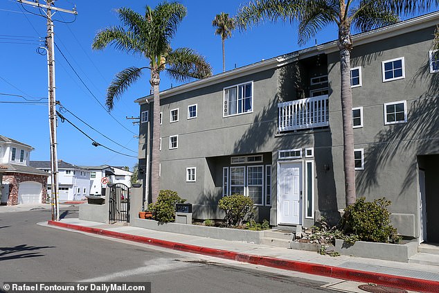 Beador, 59, was arrested for driving under the influence and hit-and-run after hitting a residential building (pictured) with her car.