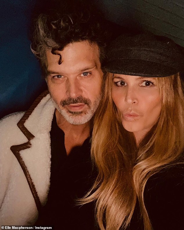 Dynamic duo: Elle Macpherson launched her Instagram page on Tuesday to celebrate her one-year relationship with guitarist Doyle Bramhall II