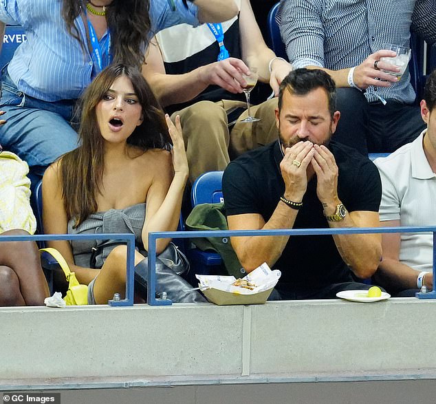 I love it: Emily Ratajkowski couldn't contain her excitement as she watched the men's singles final at the US Open on Sunday with Justin Theroux