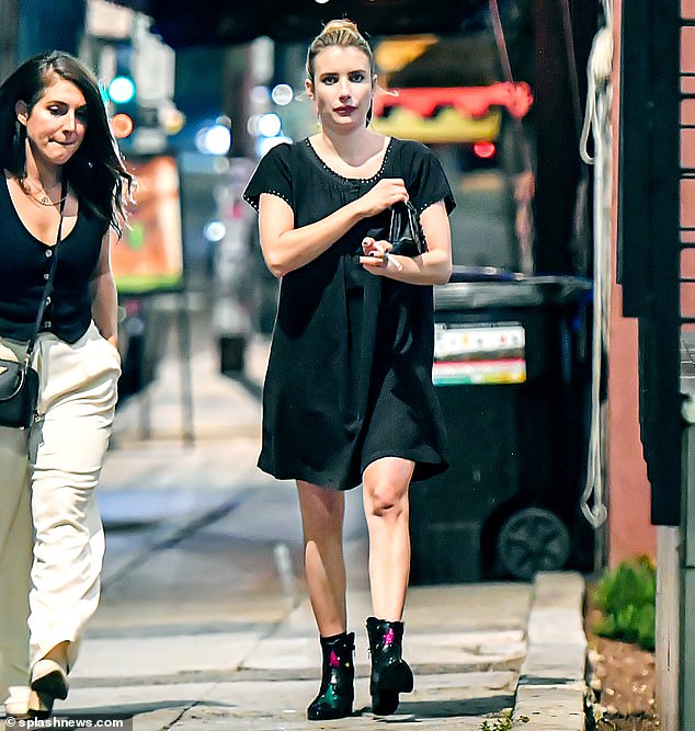 Dinner: Emma Roberts, 32, looked effortlessly chic as she stepped out for a quick smoke break after enjoying a low-key dinner in Hollywood on Monday