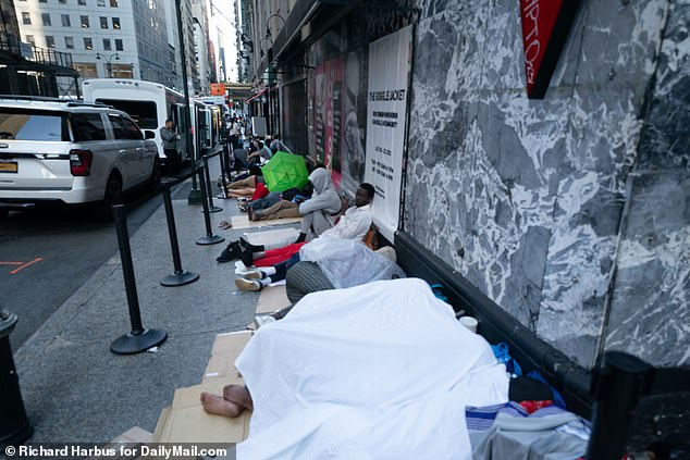 Migrants were seen sleeping outside the Roosevelt Hotel, which has reached capacity since it was transformed into a designated center for asylum seekers.