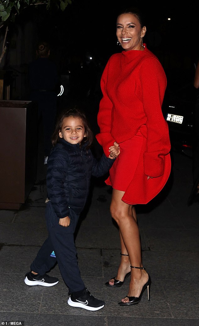 Family time: Eva Longoria, 48, spends some quality time with her son Santiago, five, after attending Victoria Beckham's Paris Fashion Week show