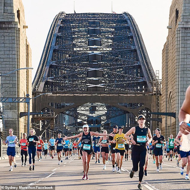 The 17,000 runners who will complete the 42 kilometer course through central Sydney on Sunday have been warned of the dangers of a heat wave (photo, participants of last year's Sydney Marathon)