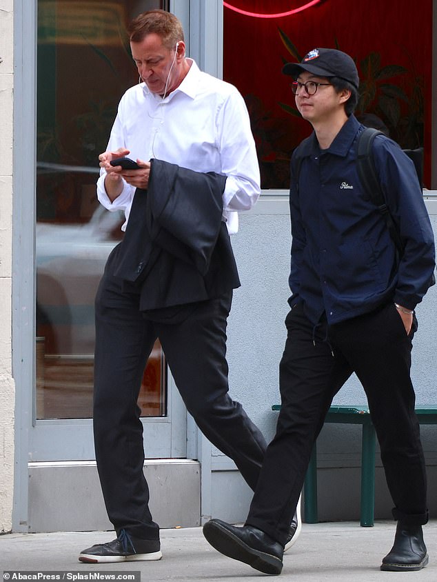 Bill... is that you?  De Blasio wears his new fall hair color while walking with a friend in Soho, New York, on September 27, 2023