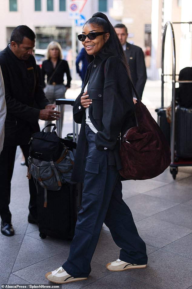 Beautiful: Gabrielle Union and Dwayne Wade looked happy as they left their hotel during Milan Fashion Week in Italy