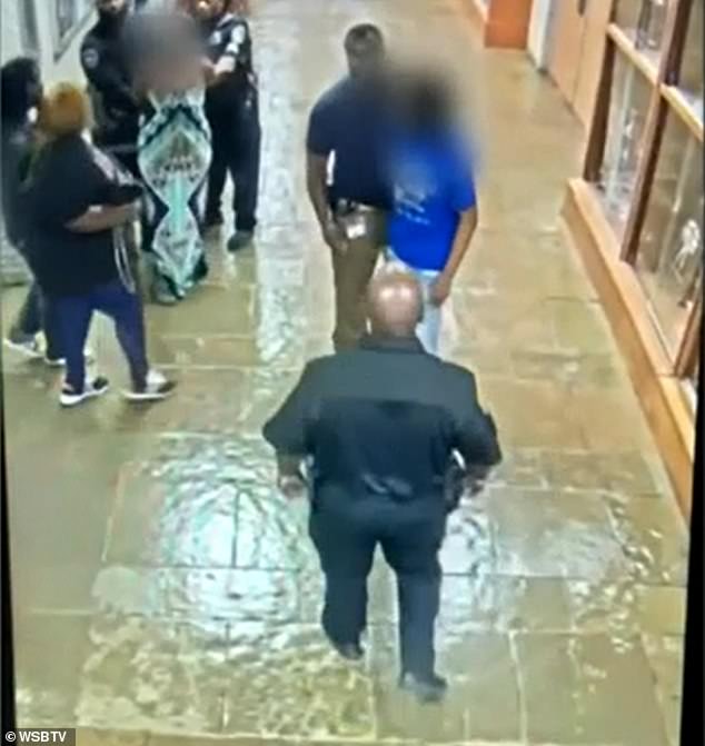 DCSD Police Chief Brad Gober allegedly knocked a student to the ground after the student appeared to dodge another officer's attempt to grab his arm on September 1