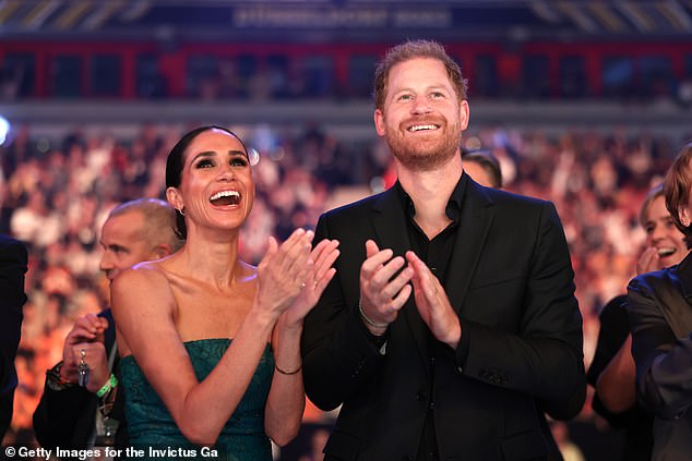 Meghan and Harry enjoy the closing ceremony at the Invictus Games in Düsseldorf