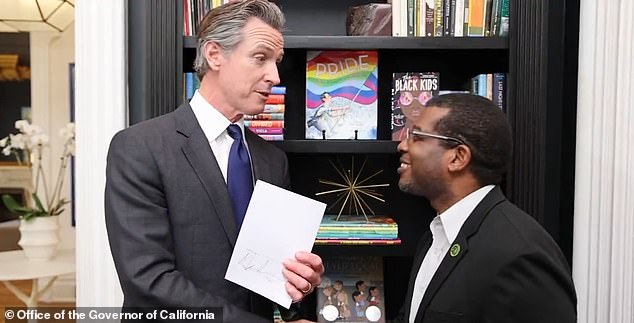 California Governor Gavin Newsom (left) said laws to prevent book bans on material promoting LGBTQ+ or racial figures were 