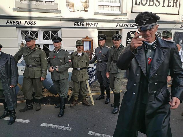 The men were confronted by crowds in Sheringham High Street in Norfolk during the annual Second World War themed festival.