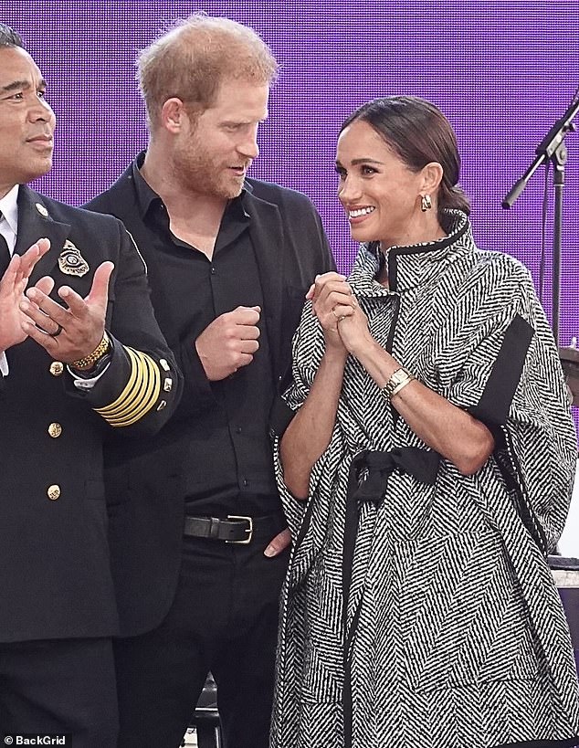 Harry and Meghan were introduced on stage as special guests and Meghan presented Kevin with an honorary award