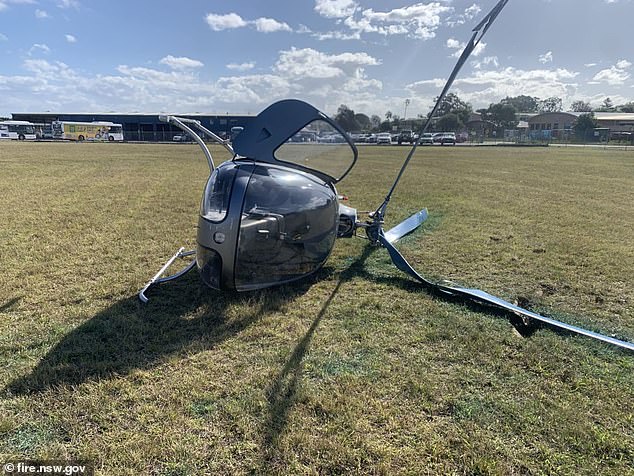 A helicopter fell from the sky in Sydney's south-west just before 2pm on Thursday and suffered extensive damage to its propellers and fuselage during the emergency landing.