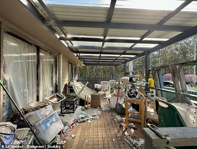 The floor of each room is completely littered with discarded clothing, rubbish, furniture and storage items, spreading all the way to the aft deck