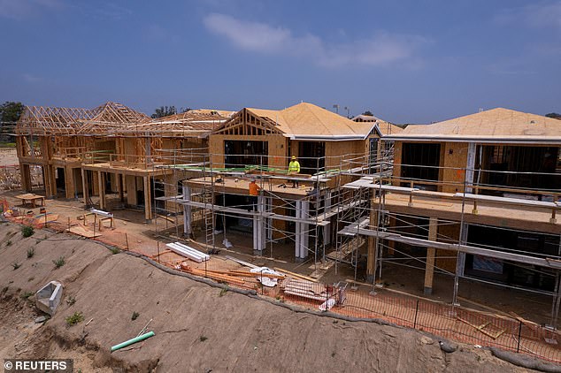 Housing construction fell in August to its lowest level since June 2020, according to data released by the US Census Bureau.  Pictured are homes under construction in Encinitas, California in May.