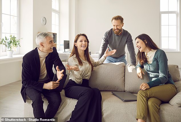 Artificial intelligence could boost Australia's sluggish productivity and force full-time professionals to work four days a week, a new report predicts (pictured is a stock photo)