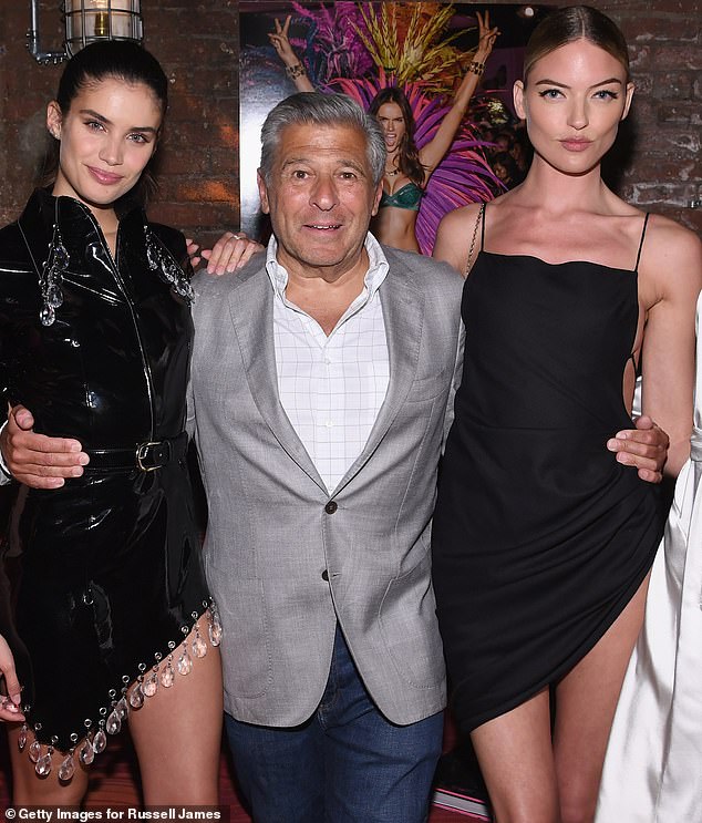 Victoria's Secret is revamping its fashion show since it was the subject of allegations including cultural appropriation, a lack of body diversity, bullying and misogyny by former Chief Marketing Officer, Ed Razek (pictured center)