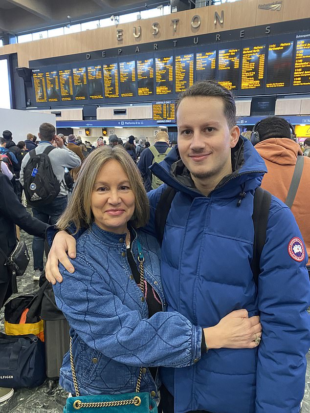 Marianne and her eldest son in London Euston as he leaves for a new life further north