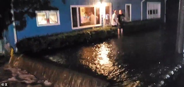 Shocking images showed severe waist-deep flooding thanks to Hurricane Lee as it barreled through Cumberland, Massachusetts, a sign of what could hit Maine this weekend